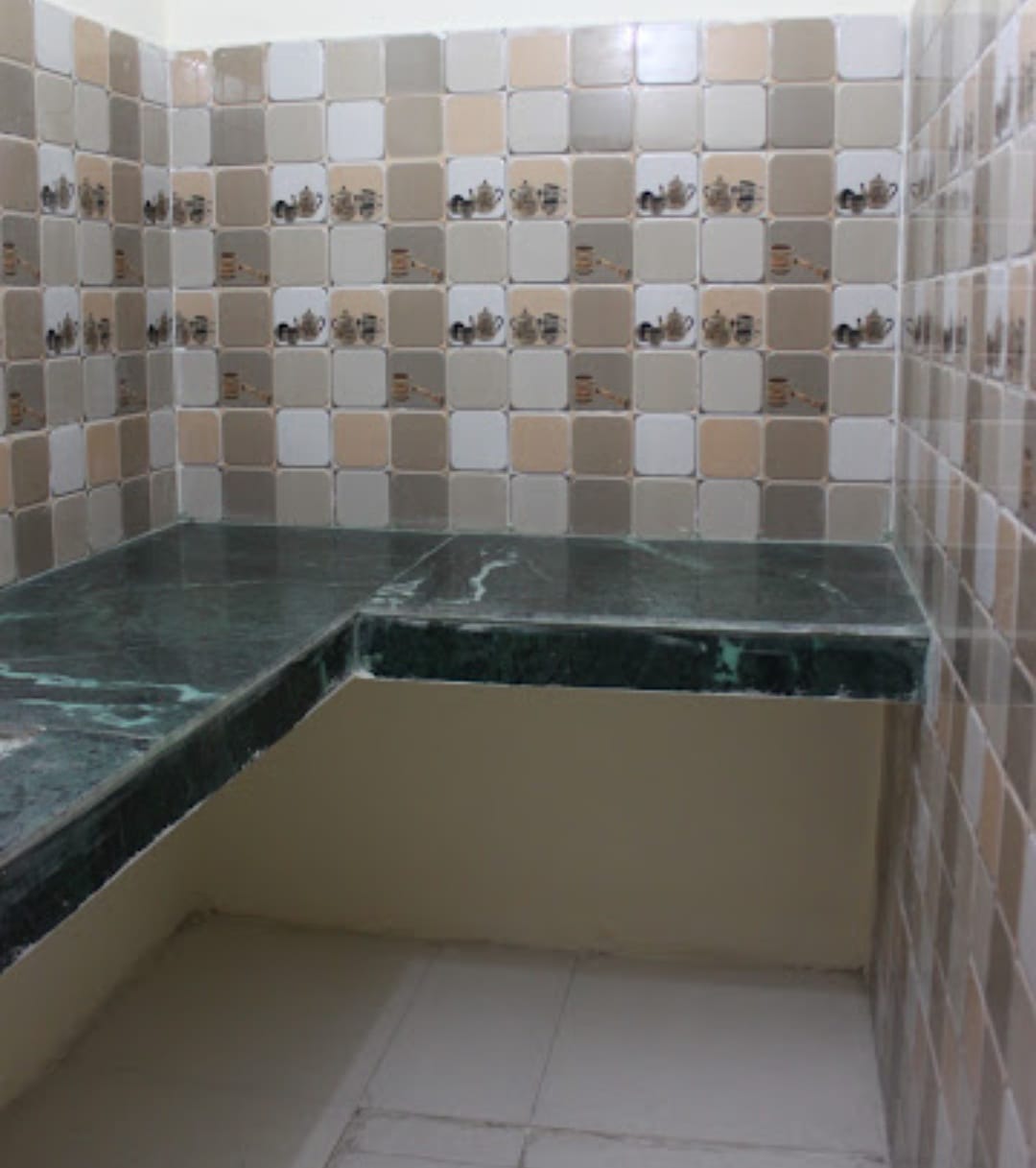 Kitchen facility at Happy International Guest House